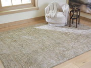 Ashley Furniture Neroham Rug, 4x3 feet, woven design with neutral tones, ideal for living room or bedroom decor.