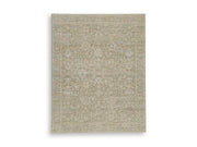 Ashley Furniture Neroham Rug with a textured, woven design in neutral tones, showcasing a stylish and comfortable home decor piece.