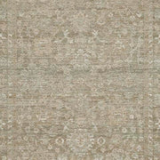 Close-up of Ashley Furniture Neroham Rug swatch showcasing textured, woven fabric in neutral tones for a stylish home accent.