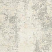 Swatch of Ashley Furniture Raif Rug featuring a textured, neutral-toned design suitable for modern living spaces.