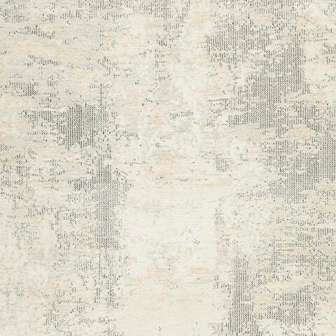 Swatch of Ashley Furniture Raif Rug featuring a textured, neutral-toned design suitable for modern living spaces.