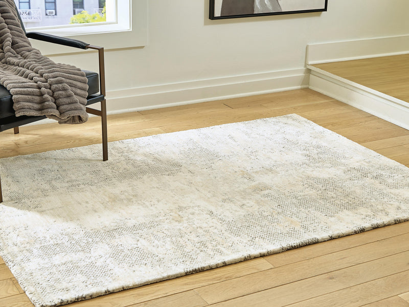 Ashley Furniture Raif Rug, 4x3 feet, woven textile with geometric pattern in neutral tones, suitable for living room or bedroom decor.