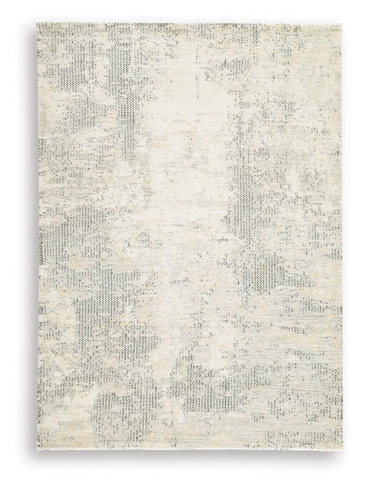 Ashley Furniture Raif Rug with intricate pattern in neutral tones, showcasing plush texture and stylish design for modern interiors.