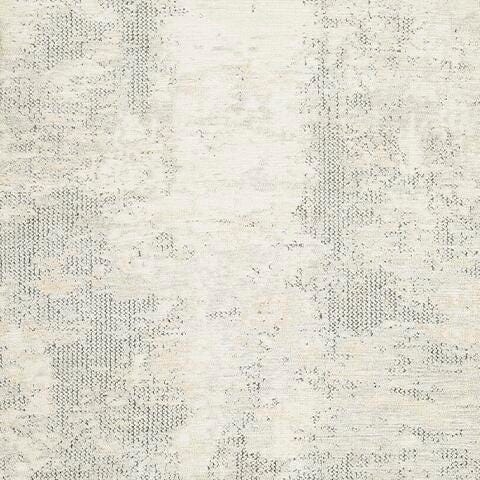 Ashley Furniture Raif Rug swatch featuring soft, woven fabric in neutral tones with subtle pattern details.