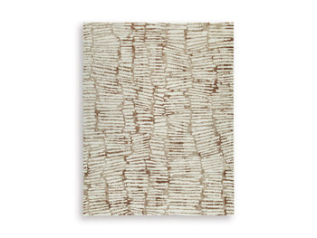 Ashley Furniture Uduak Rug with intricate patterns and neutral colors, showcasing a soft textured surface and detailed design.