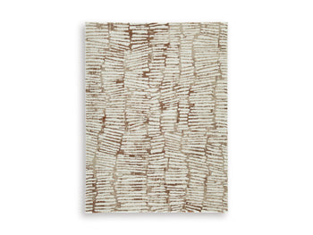 Ashley Furniture Uduak Rug with intricate patterns in neutral tones, showcasing a plush, textured surface for cozy home decor.