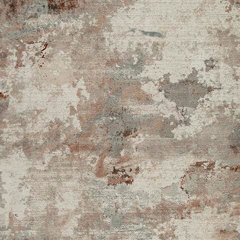 Swatch of Ashley Furniture Jadenburg Rug in neutral tones, showcasing soft woven texture and intricate pattern details.