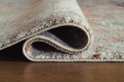 Close-up of the Ashley Furniture Jadenburg Rug showing detailed woven pattern and rich texture in neutral tones.