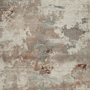 Close-up of the Ashley Furniture Jadenburg Rug featuring a textured, patterned design in neutral tones.