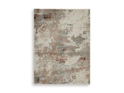 Ashley Furniture Jadenburg Rug with intricate pattern and soft texture, ideal for adding elegance to living spaces.