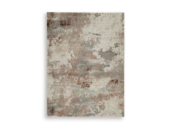 Ashley Furniture Jadenburg Rug with intricate pattern and soft texture, ideal for adding elegance to living spaces.