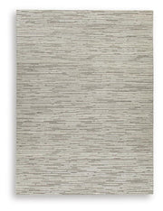 Ashley Furniture Eljory Rug with intricate patterns in warm tones, showcasing plush texture and detailed design.