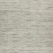 Swatch of Ashley Furniture Eljory Rug showing a textured, multicolor woven pattern suitable for living room or bedroom decor.