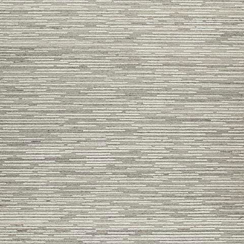 Swatch of Ashley Furniture Eljory Rug showing a textured, multicolor woven pattern suitable for living room or bedroom decor.