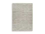 Ashley Furniture Eljory Rug with intricate patterns in warm tones, showcasing a soft textured surface.