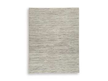 Ashley Furniture Eljory Rug with intricate pattern and neutral colors, showcasing its plush texture and stylish design.