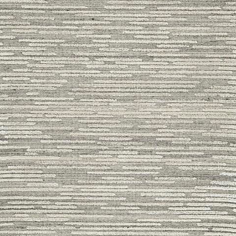 Ashley Furniture Eljory Rug swatch showing textured fabric with neutral beige and brown tones for cozy home decor