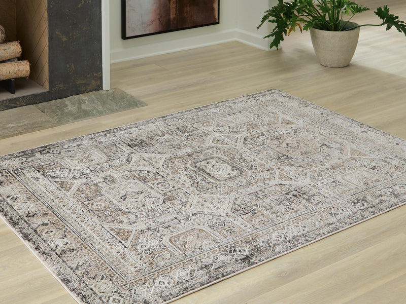 Ashley Furniture Junley Rug with a plush, textured surface in earthy tones, perfect for adding warmth to living spaces.