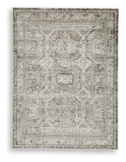 Ashley Furniture Junley Rug with intricate pattern and soft texture, ideal for enhancing living room or bedroom decor.