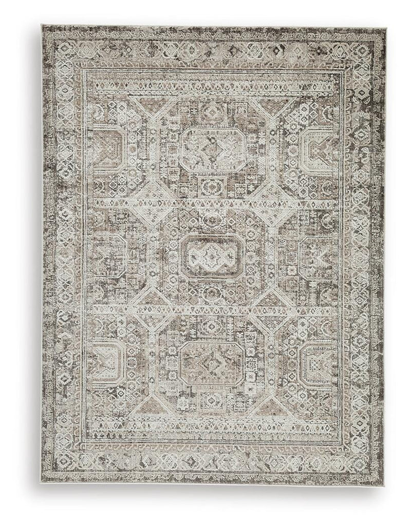 Ashley Furniture Junley Rug with intricate pattern and soft texture, ideal for enhancing living room or bedroom decor.