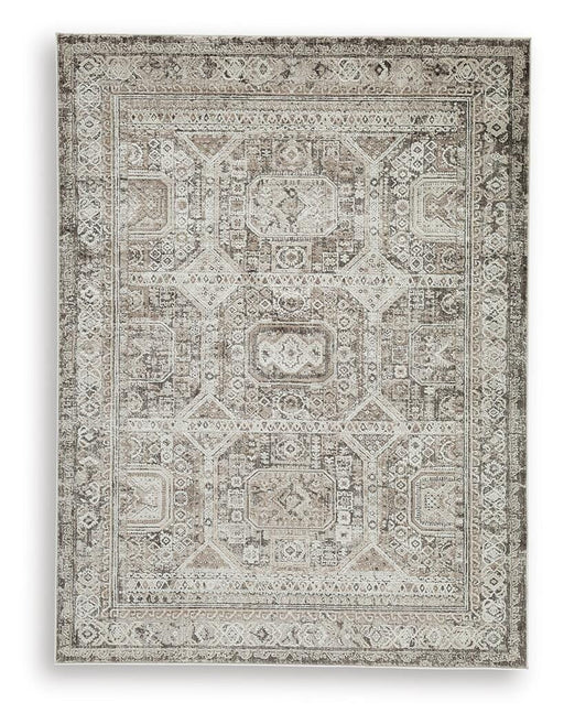 Ashley Furniture Junley Rug with intricate pattern and soft texture, ideal for enhancing living room or bedroom decor.