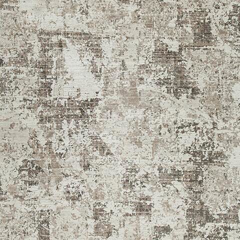 Swatch of Ashley Furniture Barricland Rug with intricate pattern and neutral tones, showcasing soft woven texture and detailed design.