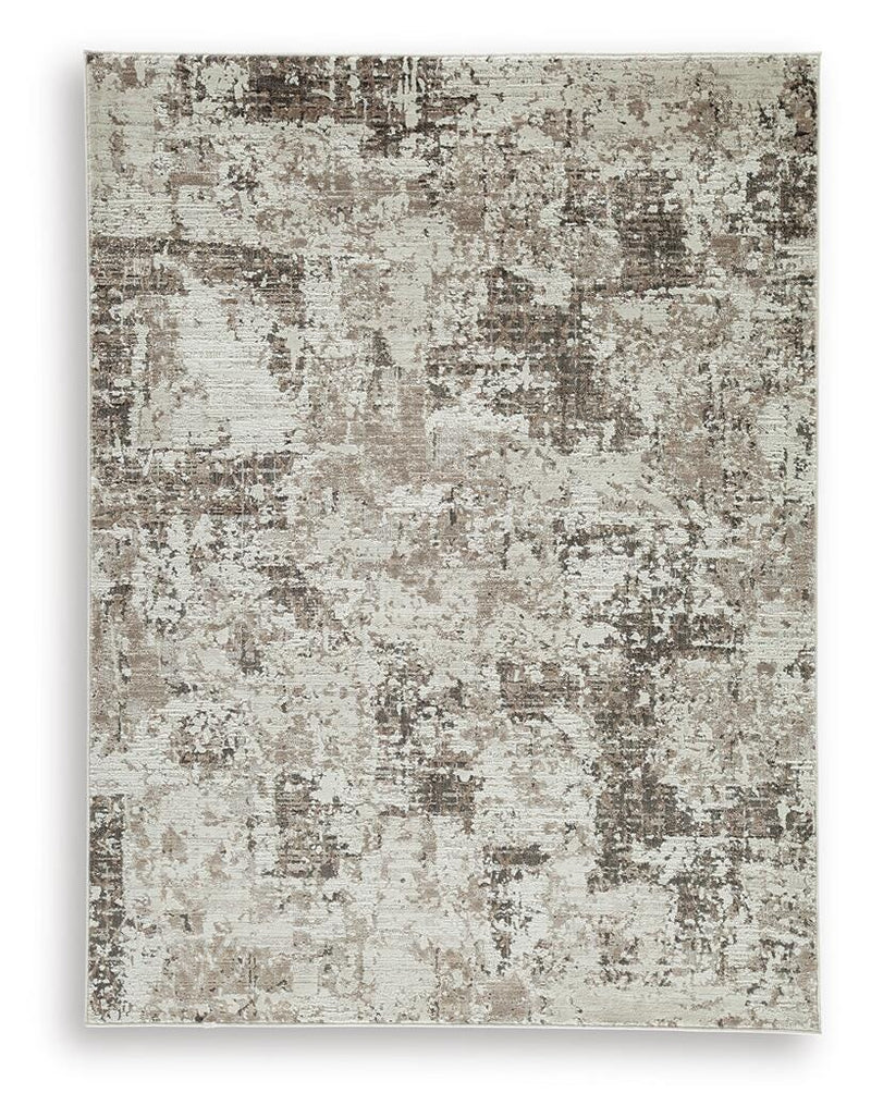 Ashley Furniture Barricland Rug with intricate pattern and warm tones, showcasing a soft, woven textile for living room decor.