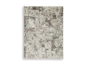 Ashley Furniture Barricland rug featuring a plush, patterned design with warm tones, ideal for enhancing living room decor.