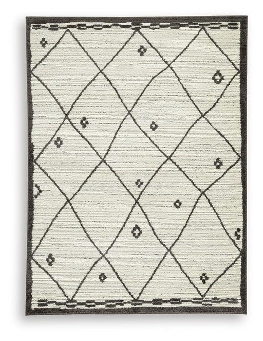 Ashley Furniture Fenriston Rug with intricate patterns in warm tones, showcasing soft, woven textile suitable for living rooms.