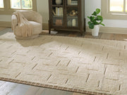 Ashley Furniture Clayman Rug, 4x3 feet, featuring a textured design in neutral tones, perfect for living room or bedroom decor.