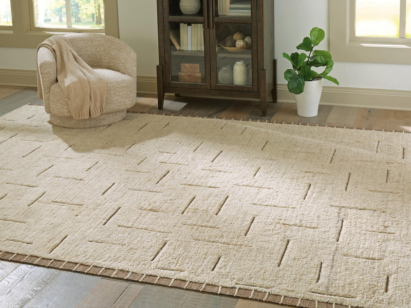 Ashley Furniture Clayman Rug, 4x3 feet, featuring a textured design in neutral tones, perfect for living room or bedroom decor.