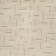 Ashley Furniture Clayman Rug swatch with textured fabric and warm earthy tones, showcasing the soft woven surface and pattern details.