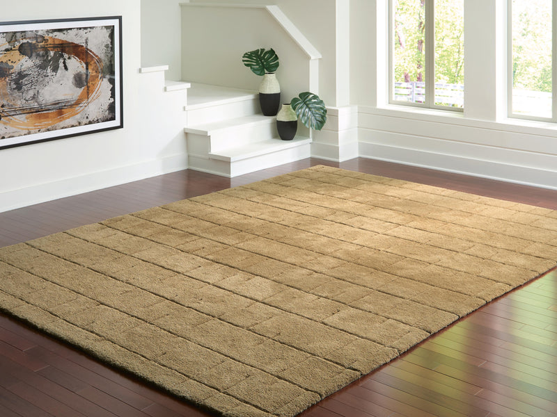 Ashley Furniture Luzmont Rug with intricate pattern, rectangular shape, and soft textured fabric in neutral tones.