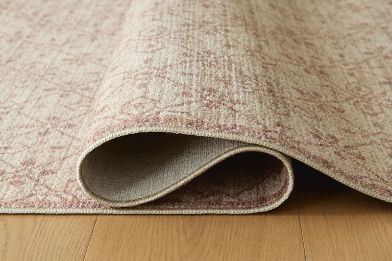 Close-up of Ashley Furniture Lyamford Rug showing detailed woven pattern and soft texture in neutral tones.