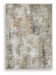 Ashley Furniture Torinette Rug with intricate patterns in neutral tones, showcasing a plush, textured surface for cozy home decor.
