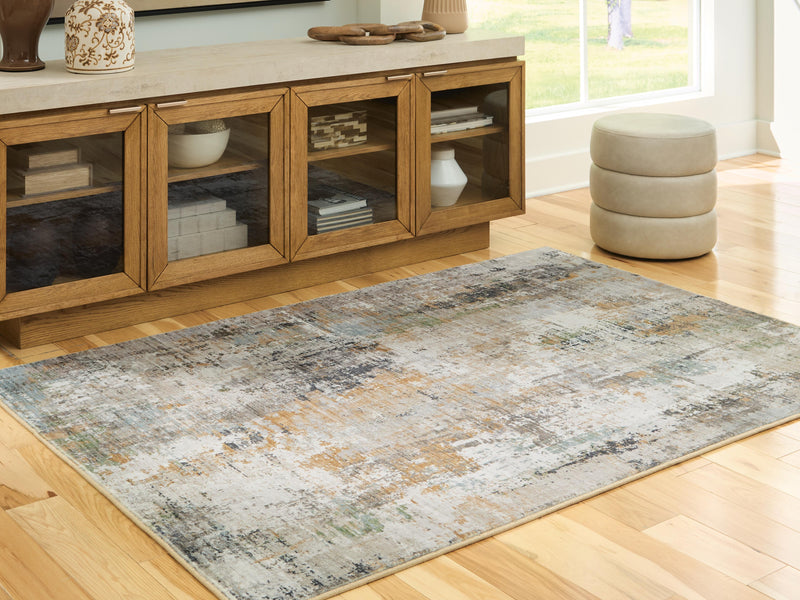 Ashley Furniture Torinette Rug with intricate pattern in neutral tones, showcasing soft, plush material and stylish design.