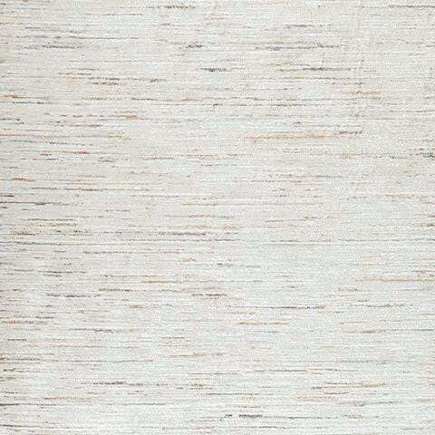 Ashley Furniture Harjot Rug swatch showing a plush, patterned rug with neutral tones and textured design.