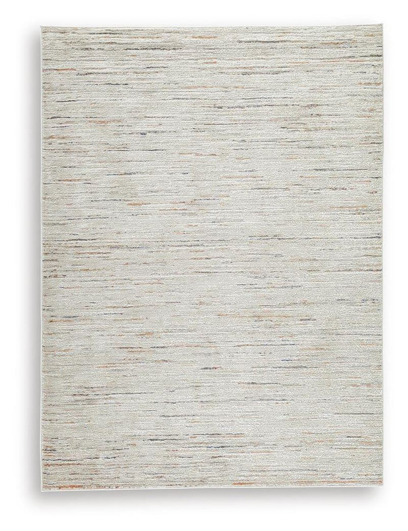 Ashley Furniture Harjot Rug featuring intricate patterns and warm tones, perfect for enhancing living room or bedroom decor.