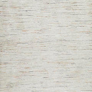 Color swatch of Ashley Furniture Harjot Rug showing textured, patterned design in neutral tones.