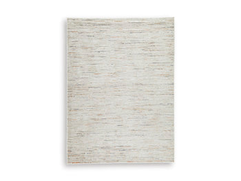Ashley Furniture Harjot Rug with intricate patterns in warm tones, ideal for cozy living room or bedroom decor.