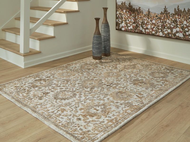 Ashley Furniture Sableridge Medium Rug with intricate patterns in neutral colors, perfect for living room or bedroom decor.