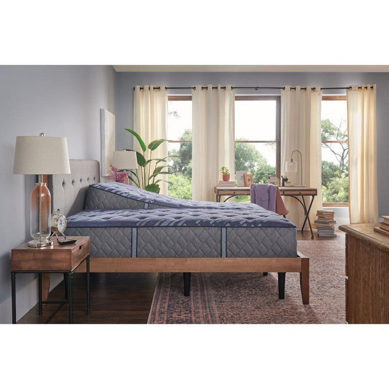Sealy Grand Jewel innerspring mattress with plush fabric cover and supportive coil system, shown on a bed frame.