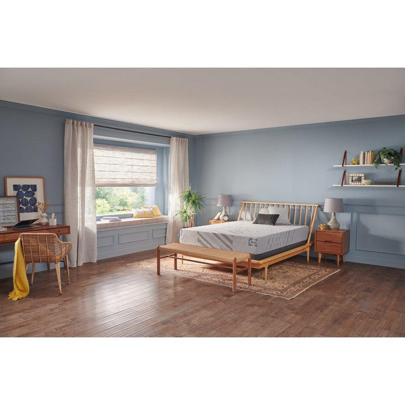 Sealy Stately Foam Mattress with plush surface and supportive design, shown in a well-made bedroom setting.