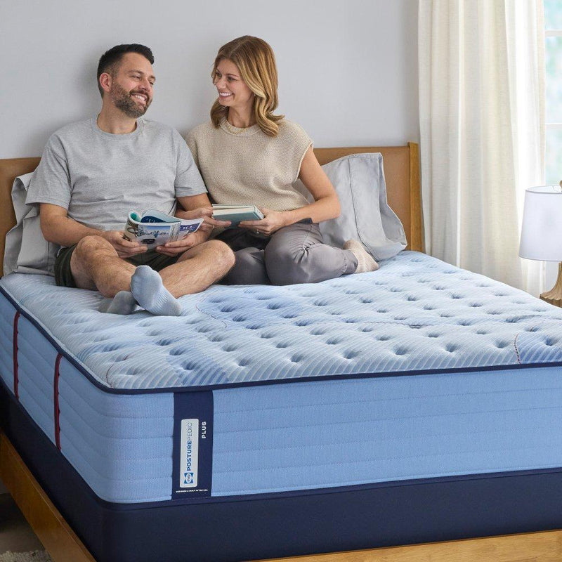 Sealy Newland Spring Mattress with plush fabric cover and supportive design, shown in a modern bedroom setting.