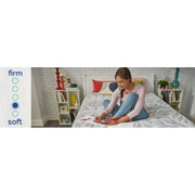 Sealy Lavina II innerspring mattress with quilted top and supportive coils, shown in a bedroom setting.