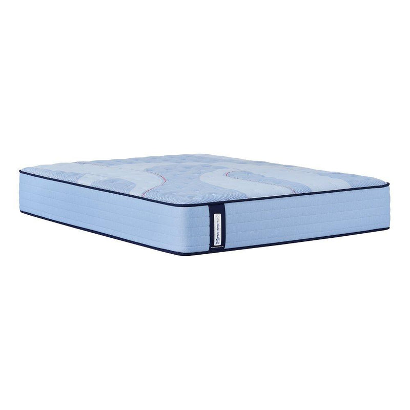 Sealy Kennett Spring Mattress with quilted top and supportive edges, shown in a well-lit bedroom setting.