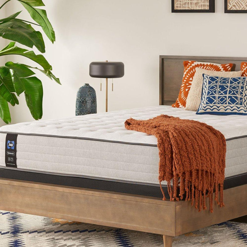Sealy Garner II innerspring mattress with plush fabric cover, showcasing a comfortable, supportive sleeping surface.