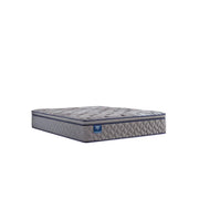 Sealy Opal House innerspring mattress with plush fabric cover and supportive coils, shown in a well-lit bedroom setting.