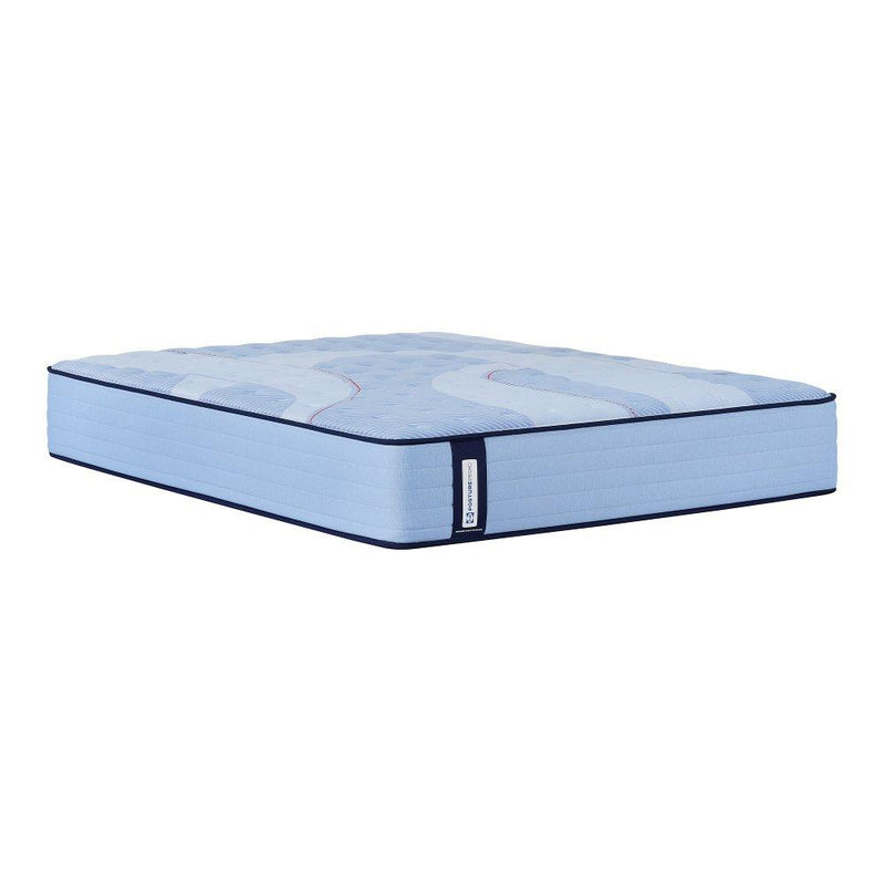 Sealy Kennett Spring Mattress with plush top, showing a neatly made bed with white sheets and pillows in a cozy bedroom setting.