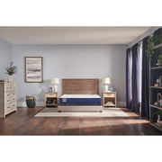 Sealy Oconee foam mattress with plush surface and supportive design, shown in a well-made bedroom setting.